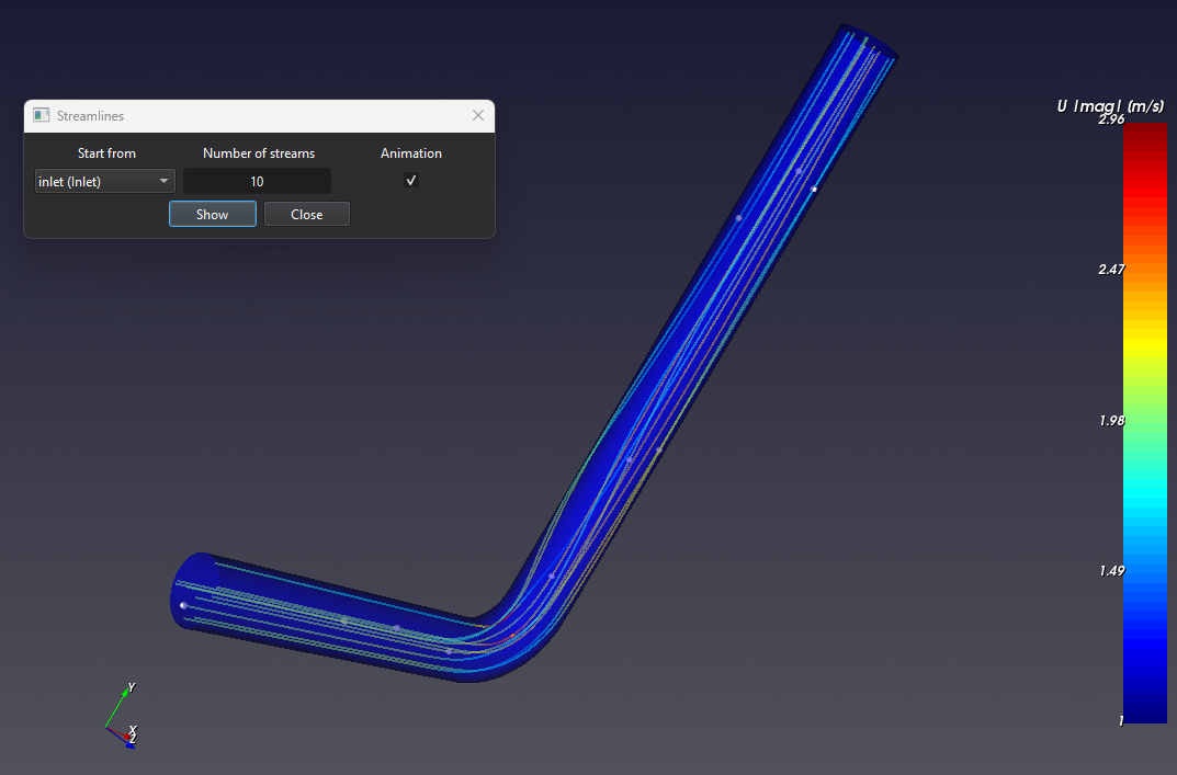 CFxD streamlines showing fluid velocity through a bent pipe